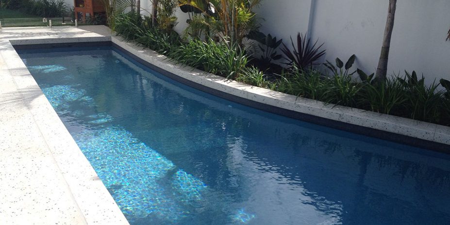 white concrete pool surrounds